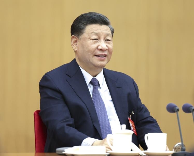 10月17日，習(xí)近平同志參加黨的二十大廣西代表團(tuán)討論。新華社記者 鞠鵬 攝